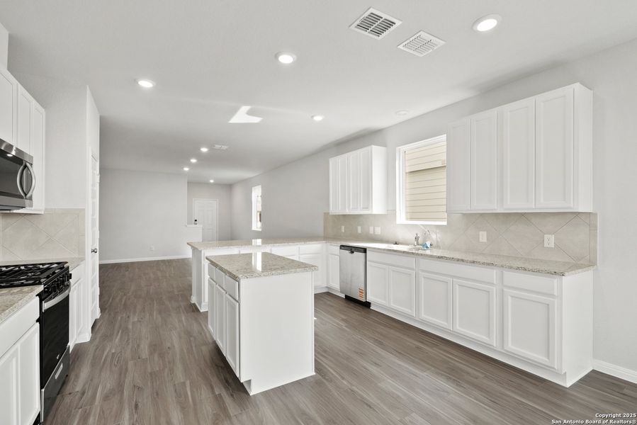 Furnished interior view inside a new home in Timber Creek, San Antonio (Image 6). Furnished interior view inside a new home in Timber Creek, San Antonio (Image 6).