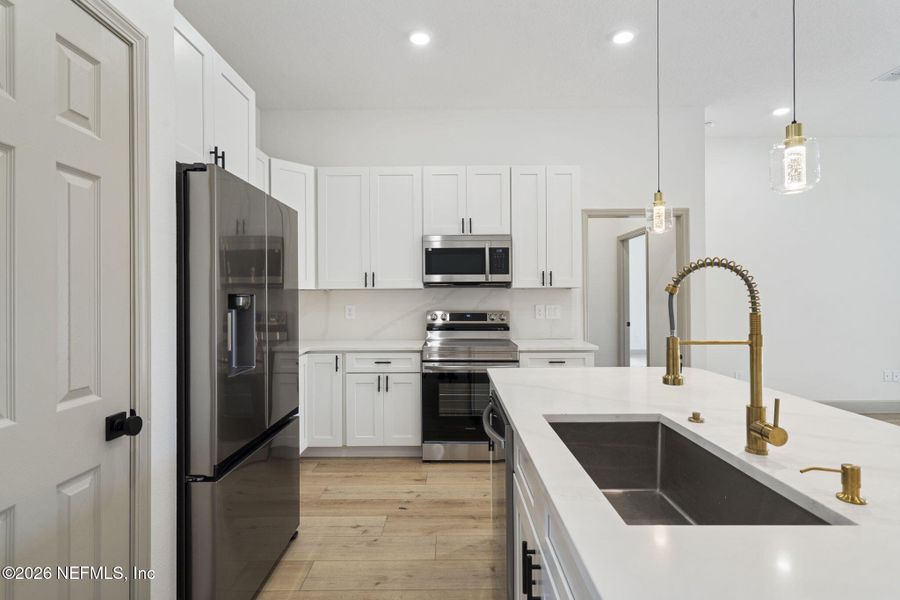 Furnished interior view inside a new home in , Orange Park (Image 18).