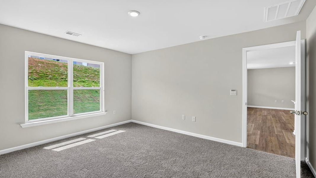 Spacious, unfurnished interior of a new home in Gibson Grove, Laurens (Image 28).