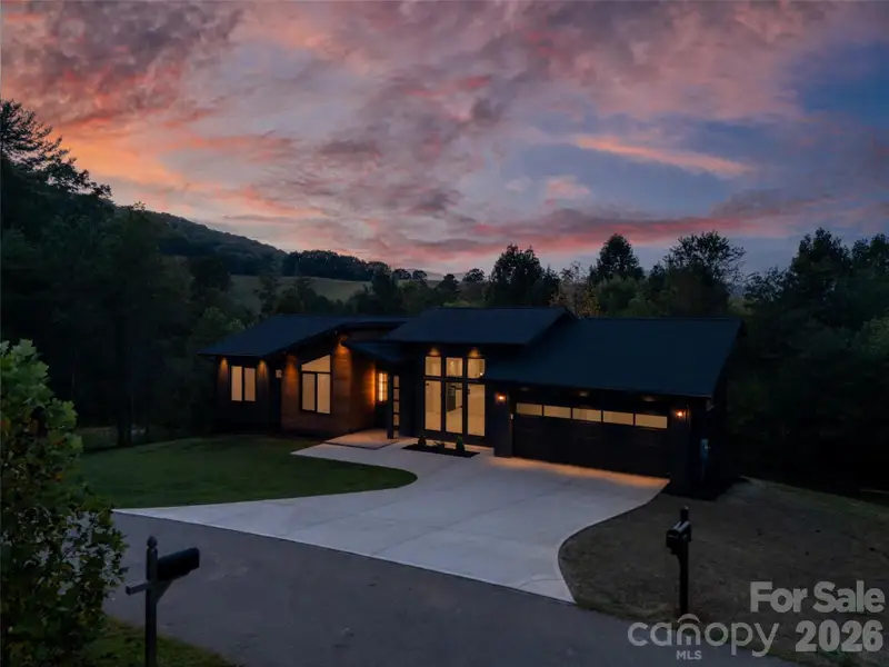Front exterior of a new home in , Leicester, NC, highlighting curb appeal (Image 2).