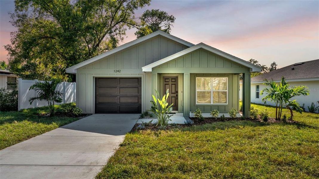 Front exterior of a new home in , Lakeland, FL, highlighting curb appeal (Image 17).