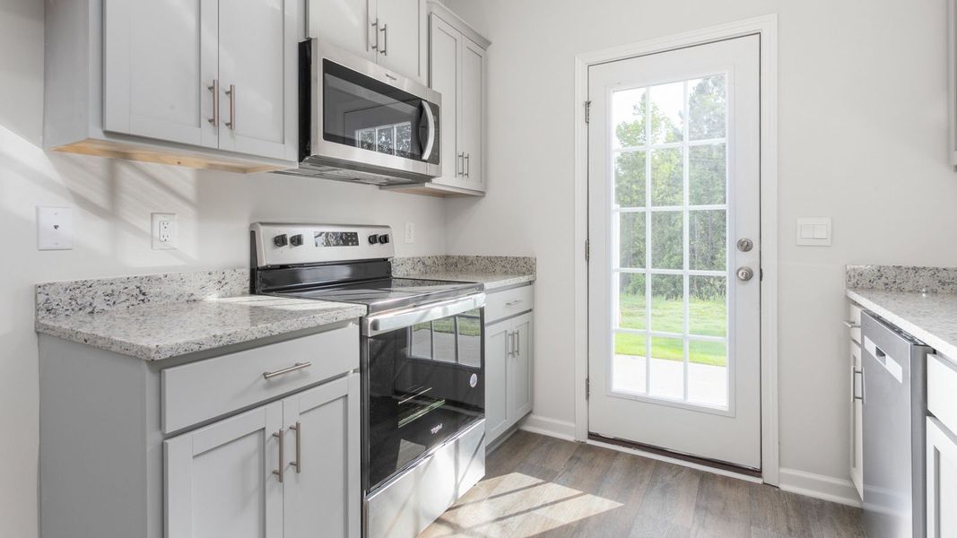 Furnished interior view inside a new home in Henley Ridge, Graham (Image 5).
