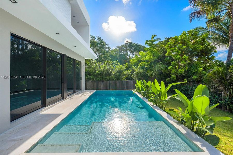 Exterior details and patio area of a home in , North Miami (Image 26).