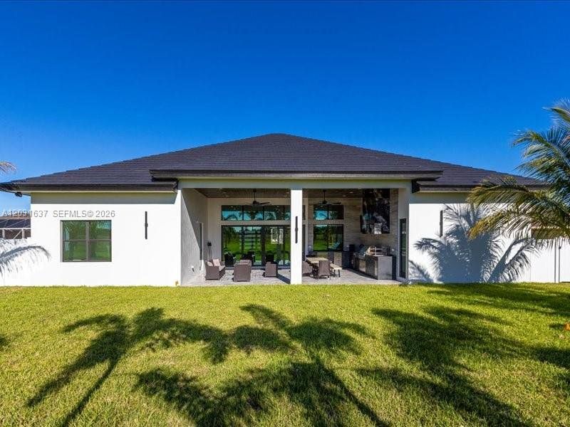 Exterior details and patio area of a home in , Port St. Lucie (Image 29).