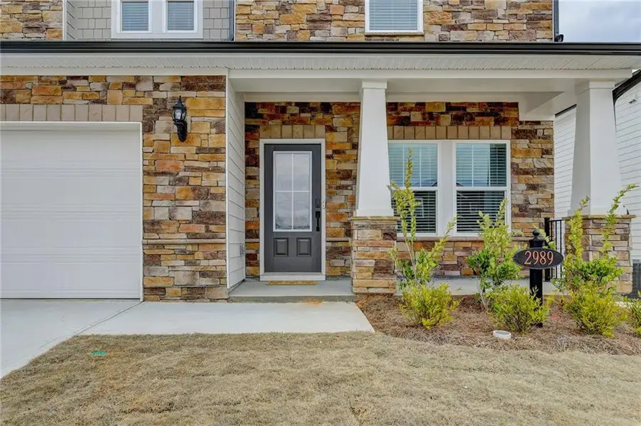 Exterior details and patio area of a home in , Braselton (Image 2). Exterior details and patio area of a home in , Braselton (Image 2).