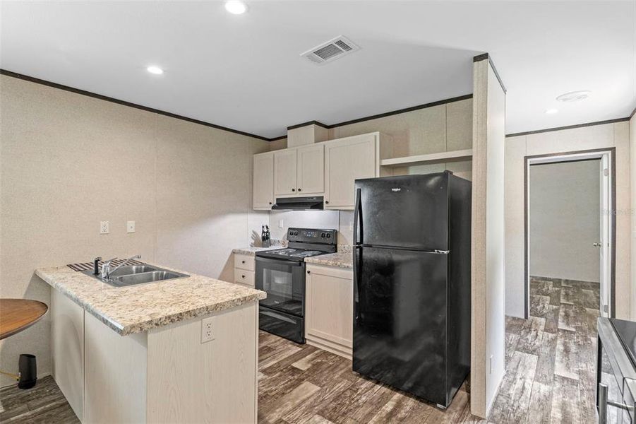 Furnished interior view inside a new home in , Webster (Image 13).