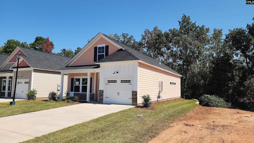 Front exterior of a new home in Bickley Station, Irmo, SC, highlighting curb appeal (Image 19). Front exterior of a new home in Bickley Station, Irmo, SC, highlighting curb appeal (Image 19).