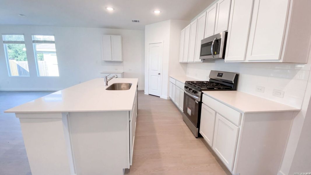 Furnished interior view inside a new home in Waterwheel, San Antonio (Image 7).