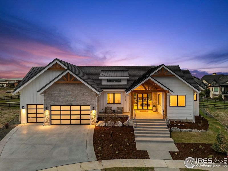 Front exterior of a new home in , Berthoud, CO, highlighting curb appeal (Image 21).