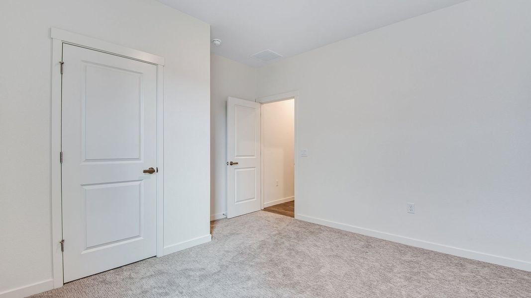 Spacious, unfurnished interior of a new home in Trails at Crowfoot, Parker (Image 17). Spacious, unfurnished interior of a new home in Trails at Crowfoot, Parker (Image 17).