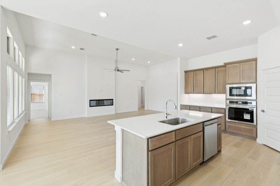 Kitchen in the Gilmour II home plan by Trophy Signature Homes – REPRESENTATIVE PHOTO