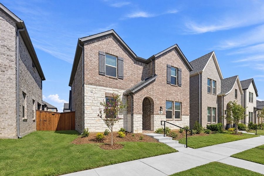 Front exterior of a new home in Cross Creek Meadows, Celina, TX, highlighting curb appeal (Image 2). Front exterior of a new home in Cross Creek Meadows, Celina, TX, highlighting curb appeal (Image 2).