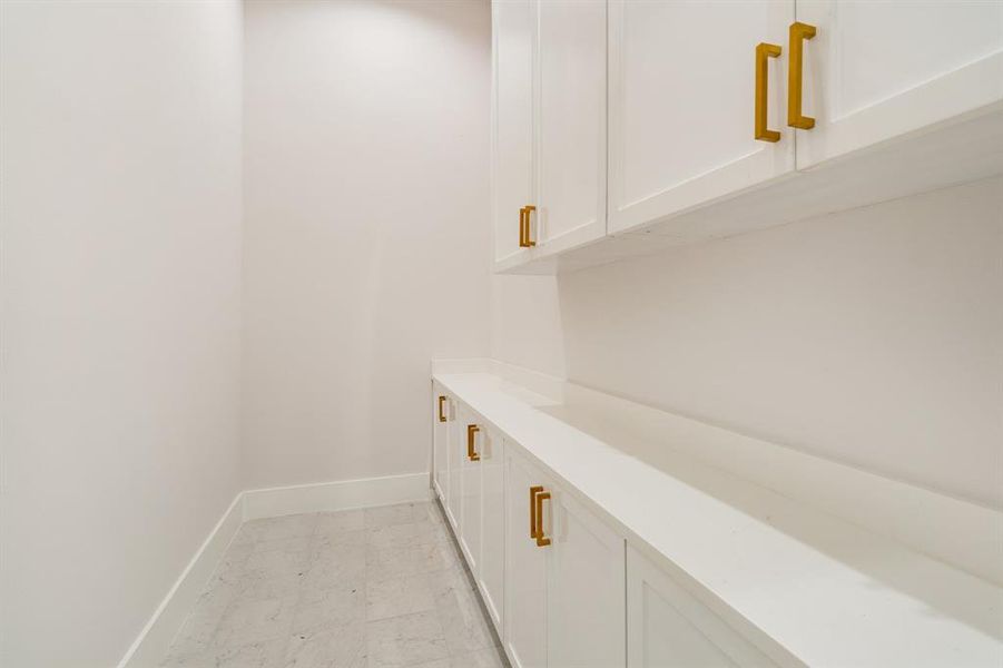 Stay organized with Costco storage and custom cabinetry, because one pantry simply isn't enough for all your needs.