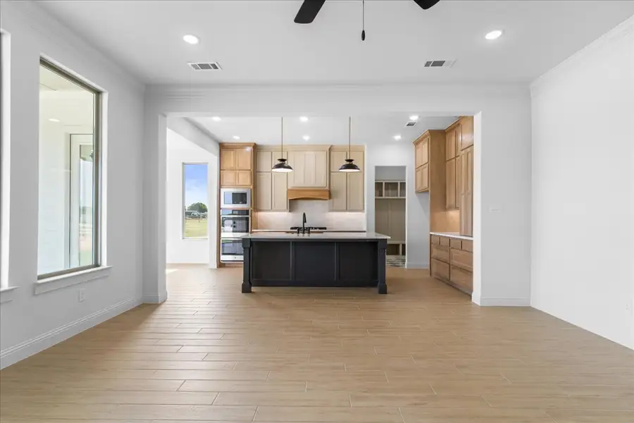 Representative furnished interior of a home built from the The Aylin by Doug Parr Custom Homes in Kessler Farms, Brock (Image 7).