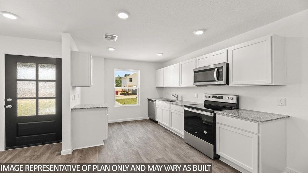 Furnished interior view inside a new home in Castles Edge, Willis (Image 3). Furnished interior view inside a new home in Castles Edge, Willis (Image 3).