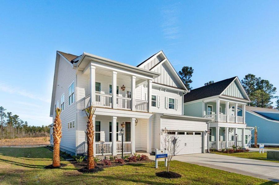 Front exterior of a new home in Kings River Preserve, Hollywood, SC, highlighting curb appeal (Image 1). Front exterior of a new home in Kings River Preserve, Hollywood, SC, highlighting curb appeal (Image 1).