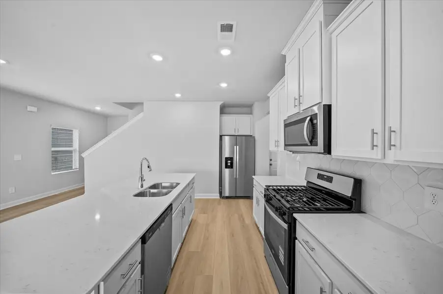 Furnished interior view inside a new home in Creek Ridge - Heritage Collection, Spartanburg (Image 4).