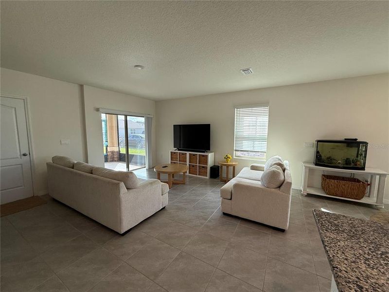 Furnished interior view inside a new home in Kindred, Kissimmee (Image 7).