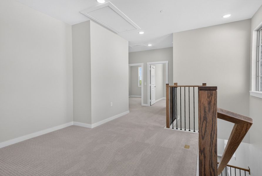 Spacious, unfurnished interior of a new home in The Tribute, The Colony (Image 35).