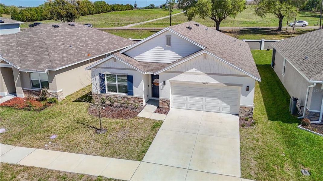 Front exterior of a new home in , San Antonio, FL, highlighting curb appeal (Image 25).