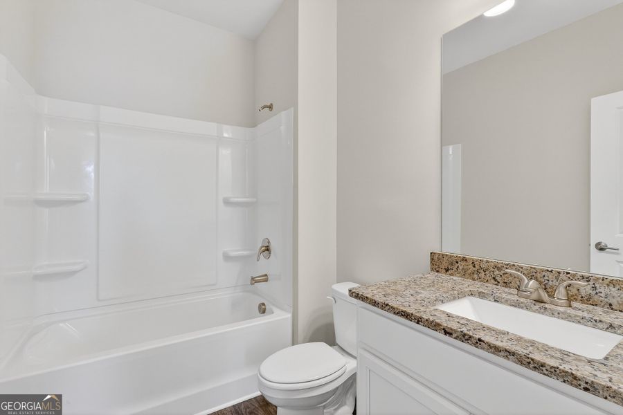 Furnished interior view inside a new home in Morning Creek Forest, Atlanta (Image 6).