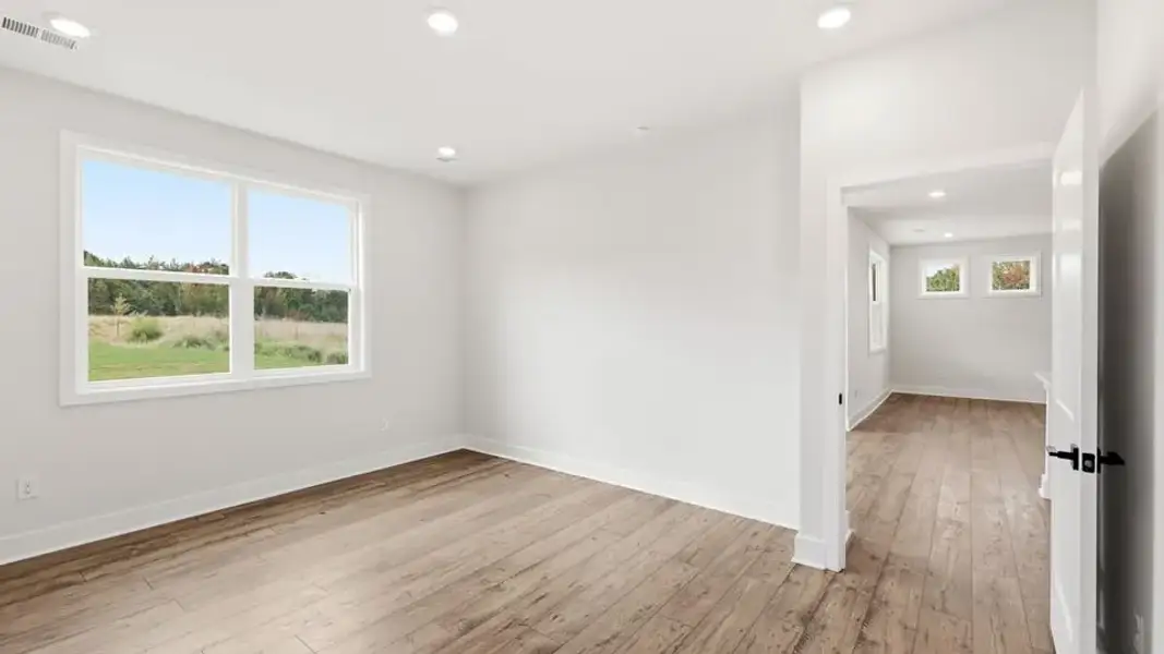 Spacious, unfurnished interior of a new home in Spring Ridge Reserve, Anderson (Image 36).