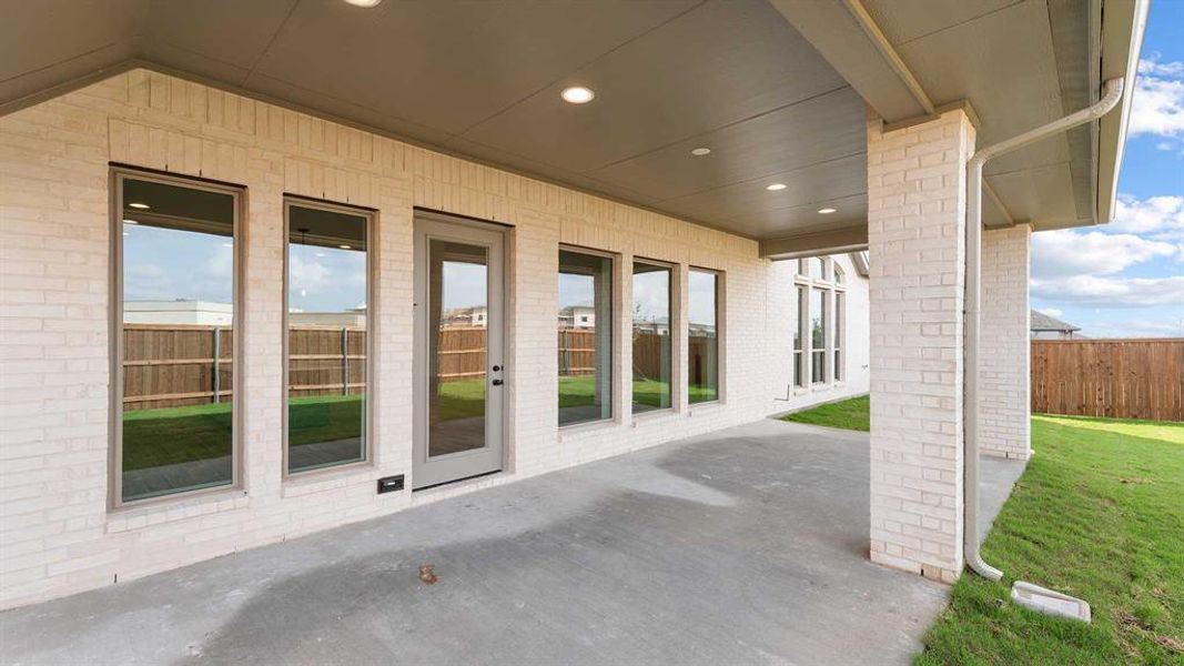 Exterior details and patio area of a home in Devonshire 55', Forney (Image 4). Exterior details and patio area of a home in Devonshire 55', Forney (Image 4).
