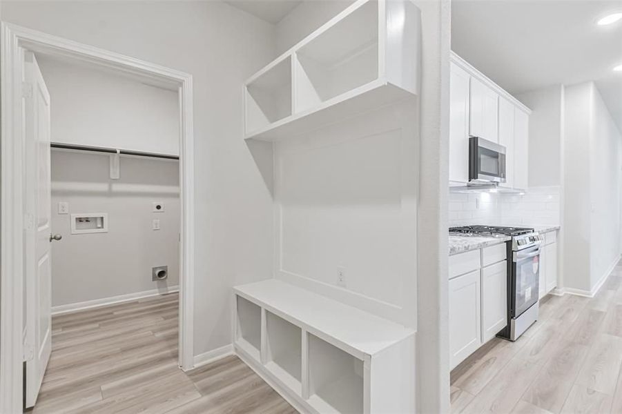 Furnished interior view inside a new home in Lakes at Black Oak, Magnolia (Image 71).
