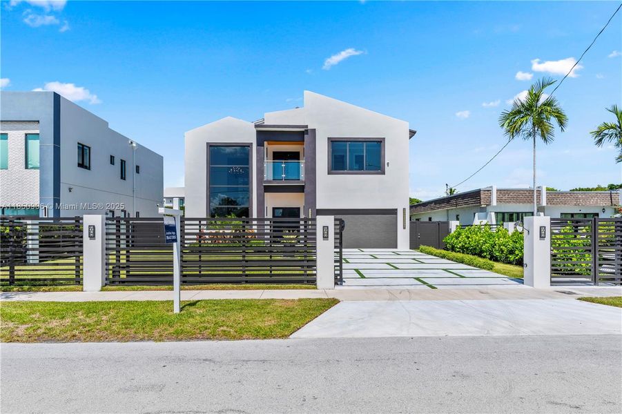 Front exterior of a new home in , Miami, FL, highlighting curb appeal (Image 24).