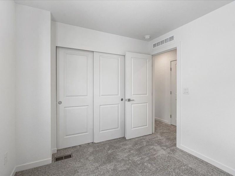 Spacious, unfurnished interior of a new home in The Hub at Virginia Village, Denver (Image 18).