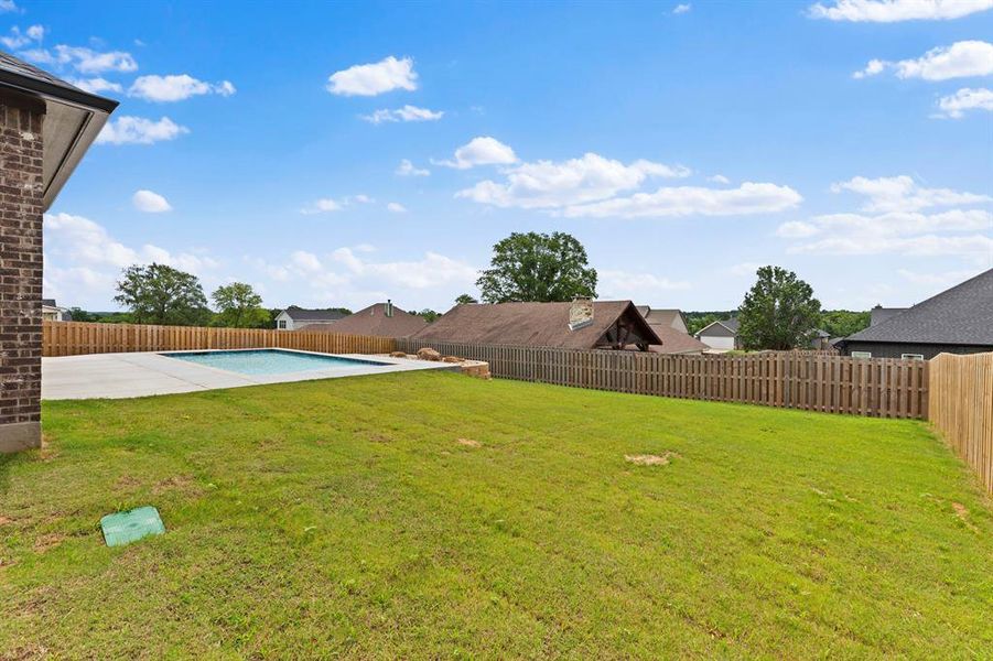 Exterior details and patio area of a home in , Lindale (Image 28).