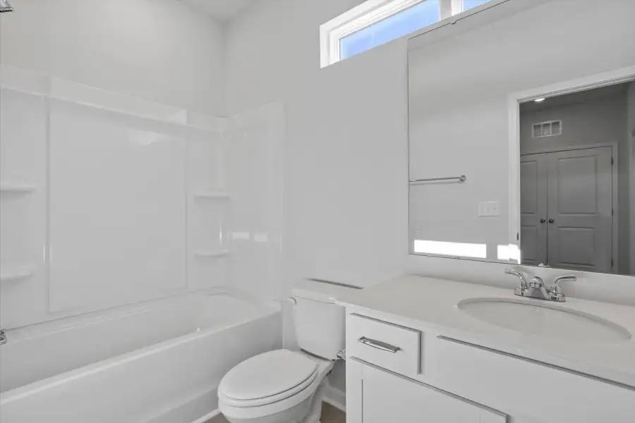 Furnished interior view inside a new home in West Main Townhomes, Sanford (Image 10).