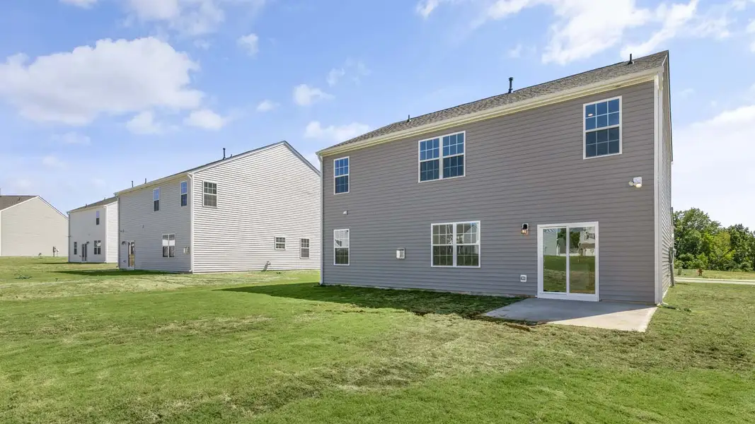 Exterior details and patio area of a home in Villa Grande, Winterville (Image 3).