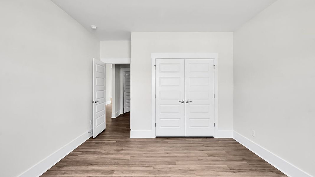 Spacious, unfurnished interior of a new home in The Haven at Indigo Preserve, Leland (Image 17).