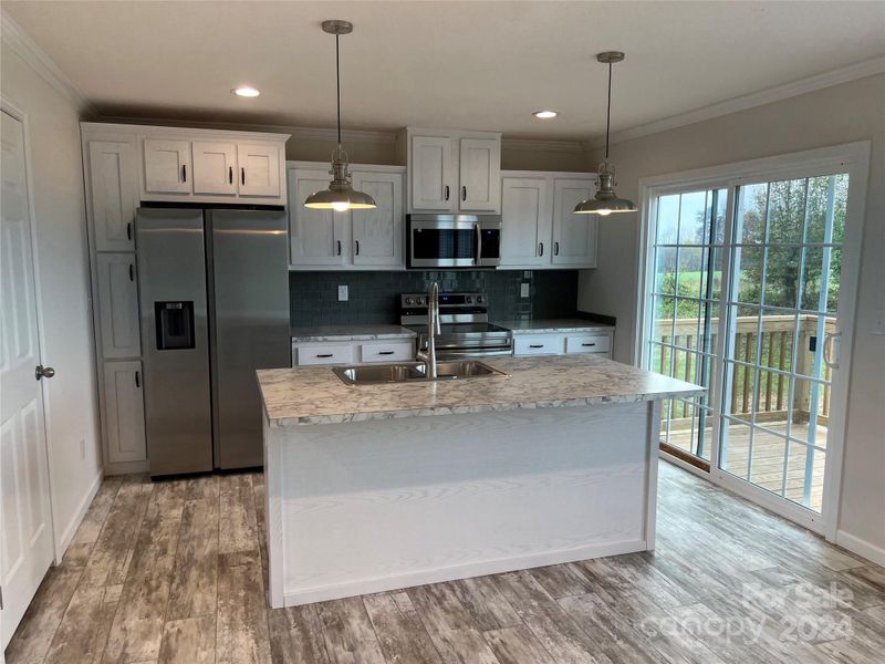 Furnished interior view inside a new home in , Stony Point (Image 10).