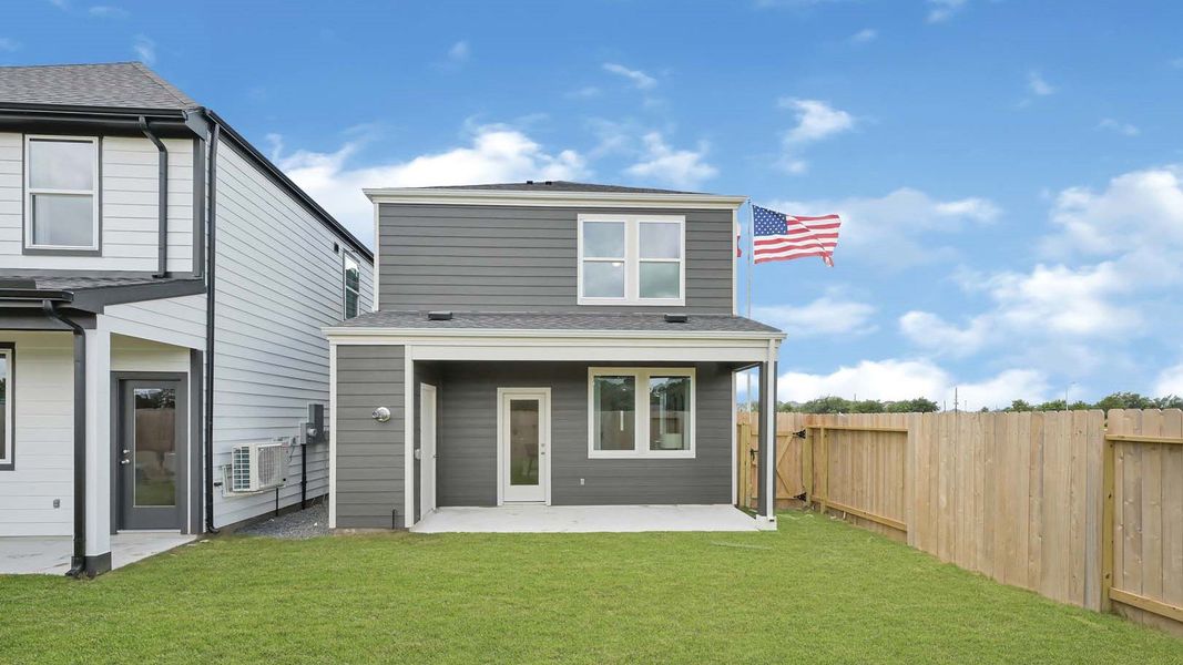Exterior details and patio area of a home in Villarosa at Tamarron, Katy (Image 25).