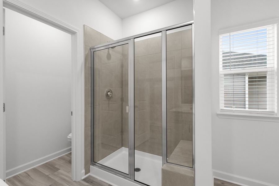 Furnished interior view inside a new home in Cypress Ridge - The Boardwalk Series, Longs (Image 10).