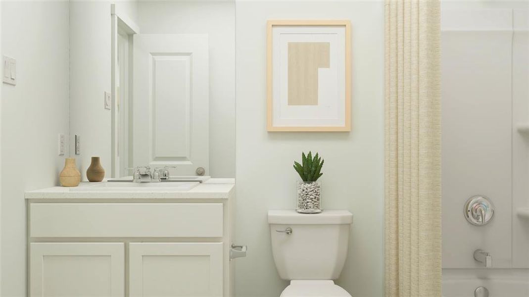 Full bathroom featuring vanity, toilet, and shower / bath combo with shower curtain