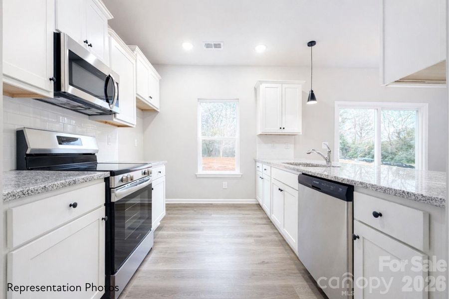 Furnished interior view inside a new home in , Charlotte (Image 8). Furnished interior view inside a new home in , Charlotte (Image 8).