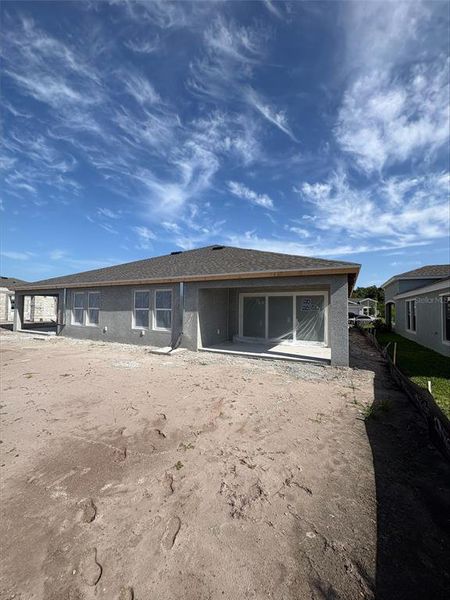 Exterior details and patio area of a home in Crosswind Point, Parrish (Image 3).