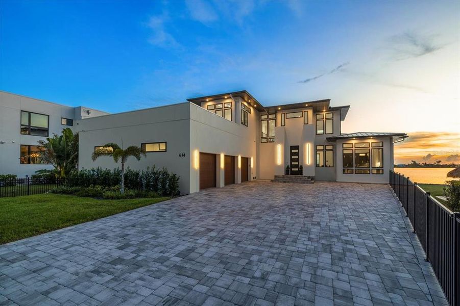 Front exterior of a new home in , Osprey, FL, highlighting curb appeal (Image 28).
