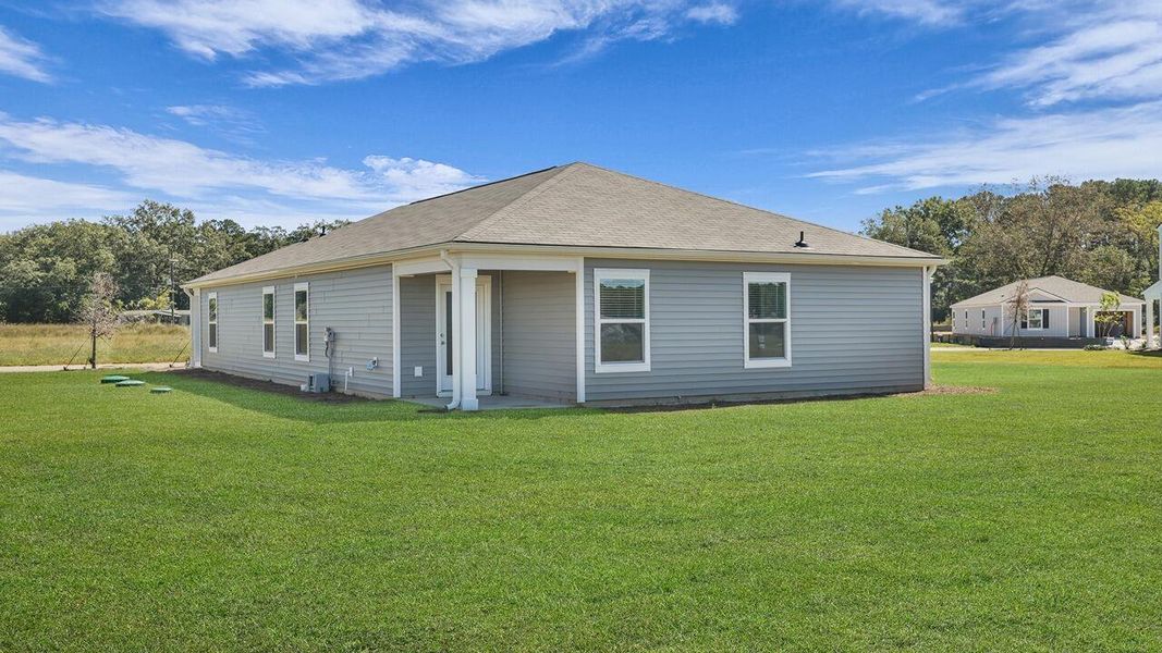 Exterior details and patio area of a home in Evergreen, Holly Hill (Image 4).