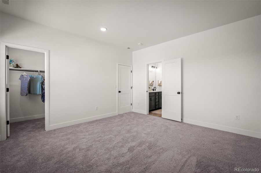 Spacious, unfurnished interior of a new home in Revel Crossing at Wolf Ranch - The Panorama Collection, Colorado Springs (Image 29).