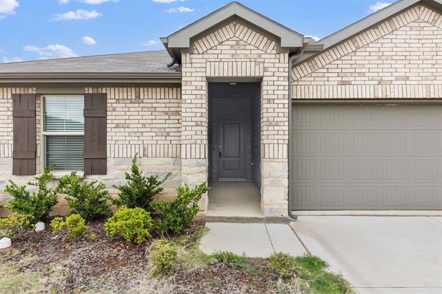 Exterior details and patio area of a home in Rosewood at Beltmill, Fort Worth (Image 23).