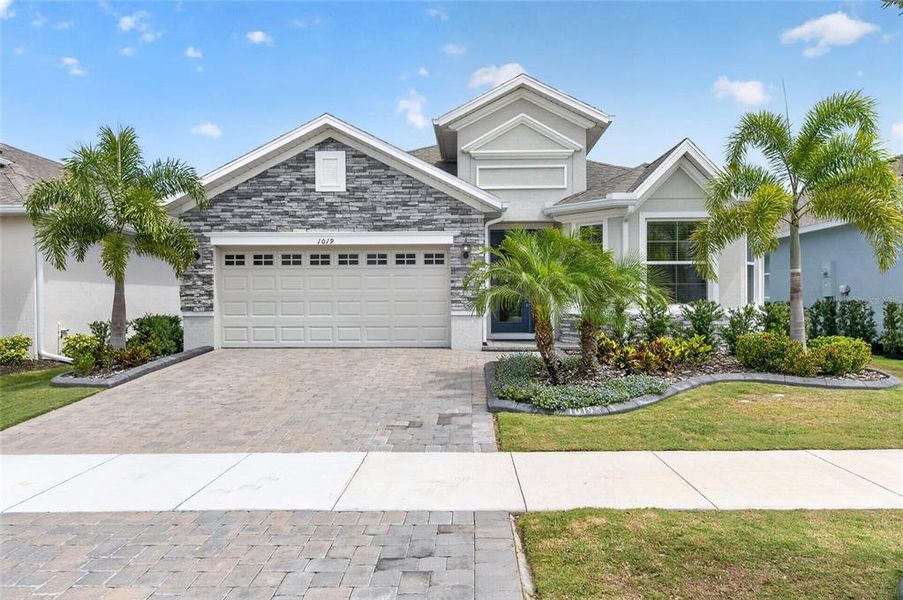 Front exterior of a new home in , Apollo Beach, FL, highlighting curb appeal (Image 26).