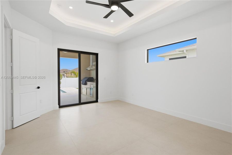 Luxurious owner's suite is a true private retreat featuring lanai access, custom illuminated walk-in closets Luxurious owner's suite is a true private retreat featuring lanai access, custom illuminated walk-in closets