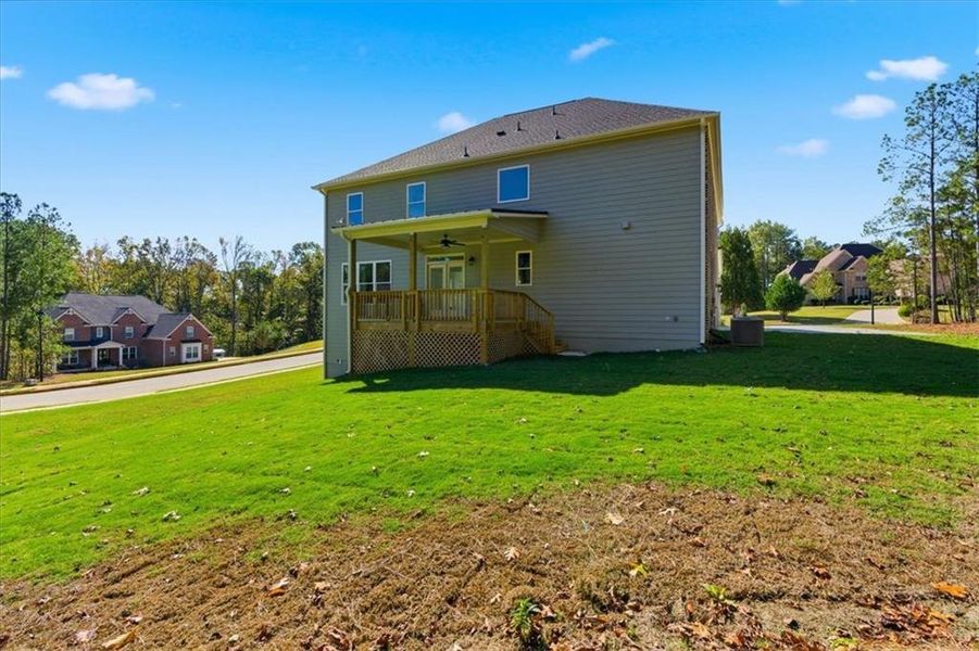 Exterior details and patio area of a home in The Estates at Hurricane Pointe, Douglasville (Image 4).