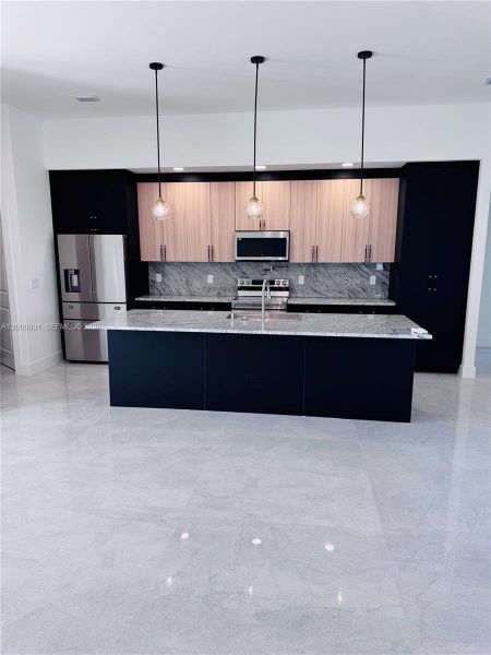 Furnished interior view inside a new home in , Port Charlotte (Image 11).