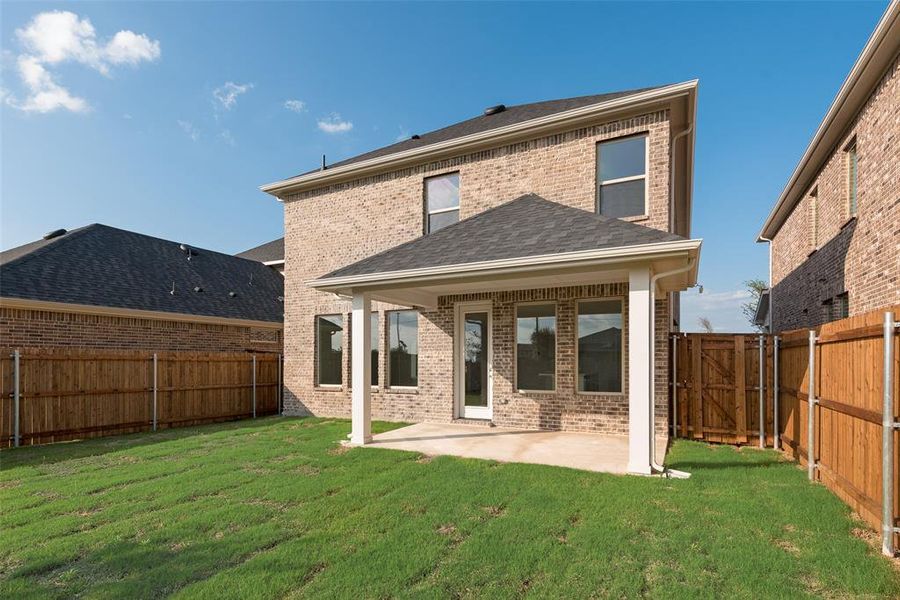 Front exterior of a new home in Walden Pond, Forney, TX, highlighting curb appeal (Image 18). Front exterior of a new home in Walden Pond, Forney, TX, highlighting curb appeal (Image 18).