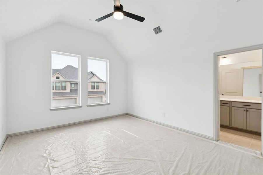 This peaceful light filled owner's bedroom is the perfect place to relax after a long day.